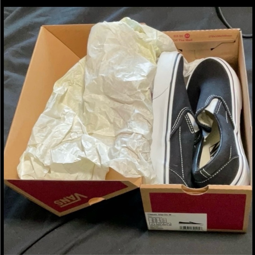 Vans Black and White Slip-On Shoes